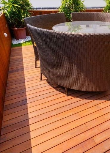 Premium solid timber decking planks with natural wood grain finish